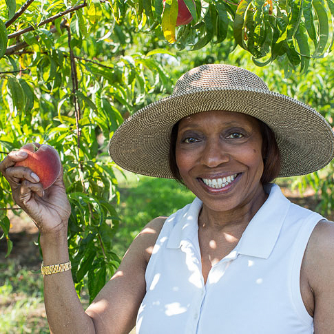 Belinda in a peach grove