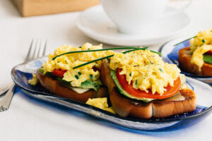Fluffy Scrambled Eggs on Texas Toast with Swiss Cheese