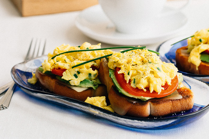 Fluffy Scrambled Eggs on Texas Toast with Swiss Cheese